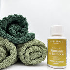 diamante Bamboo next to towels on white background 100ml bottle by aROMA Laundry.