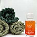 Sole next to towels on white background in 100ml by aROMA Laundry